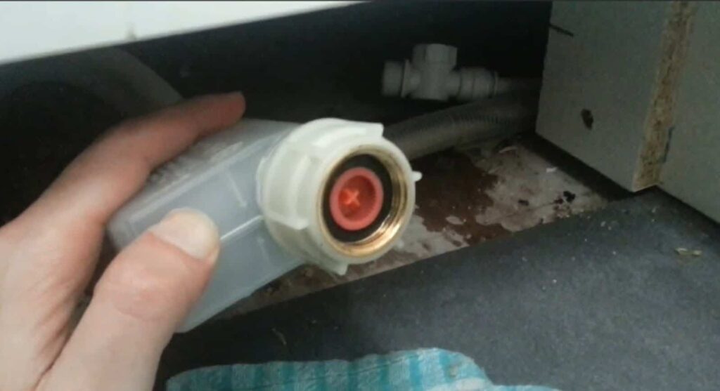 How to clean and maintain a dishwashers water valve?