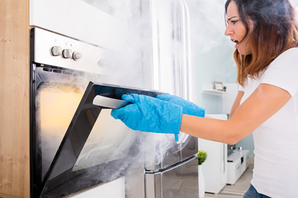 How Can I Prevent My Oven From Smoking During Cooking?